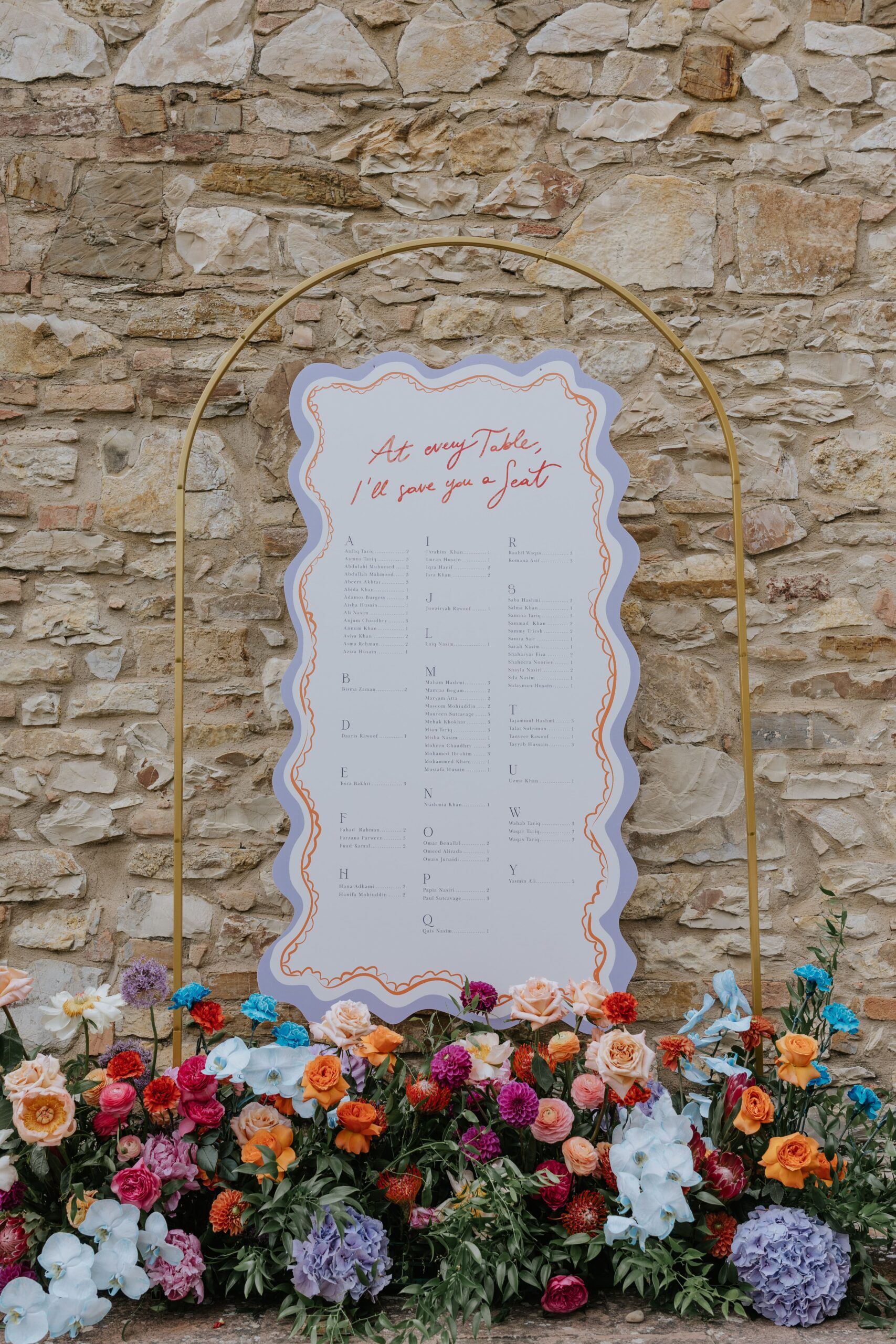 CheChic - Destination wedding Italy - Asyla & Aafaq - Bespoke Indian wedding in Tuscany1 A colorful and lush wedding table seat