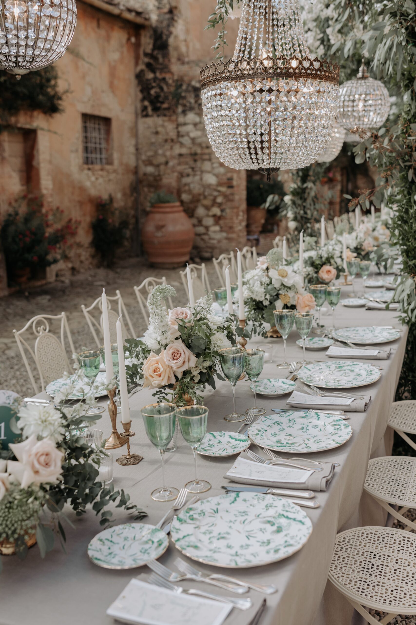 CheChic - Destination wedding Italy - Asyla & Aafaq - Bespoke Indian wedding in Tuscany29 Soft pink and green setup on Imperial tables with candles and crystal chandeliers
