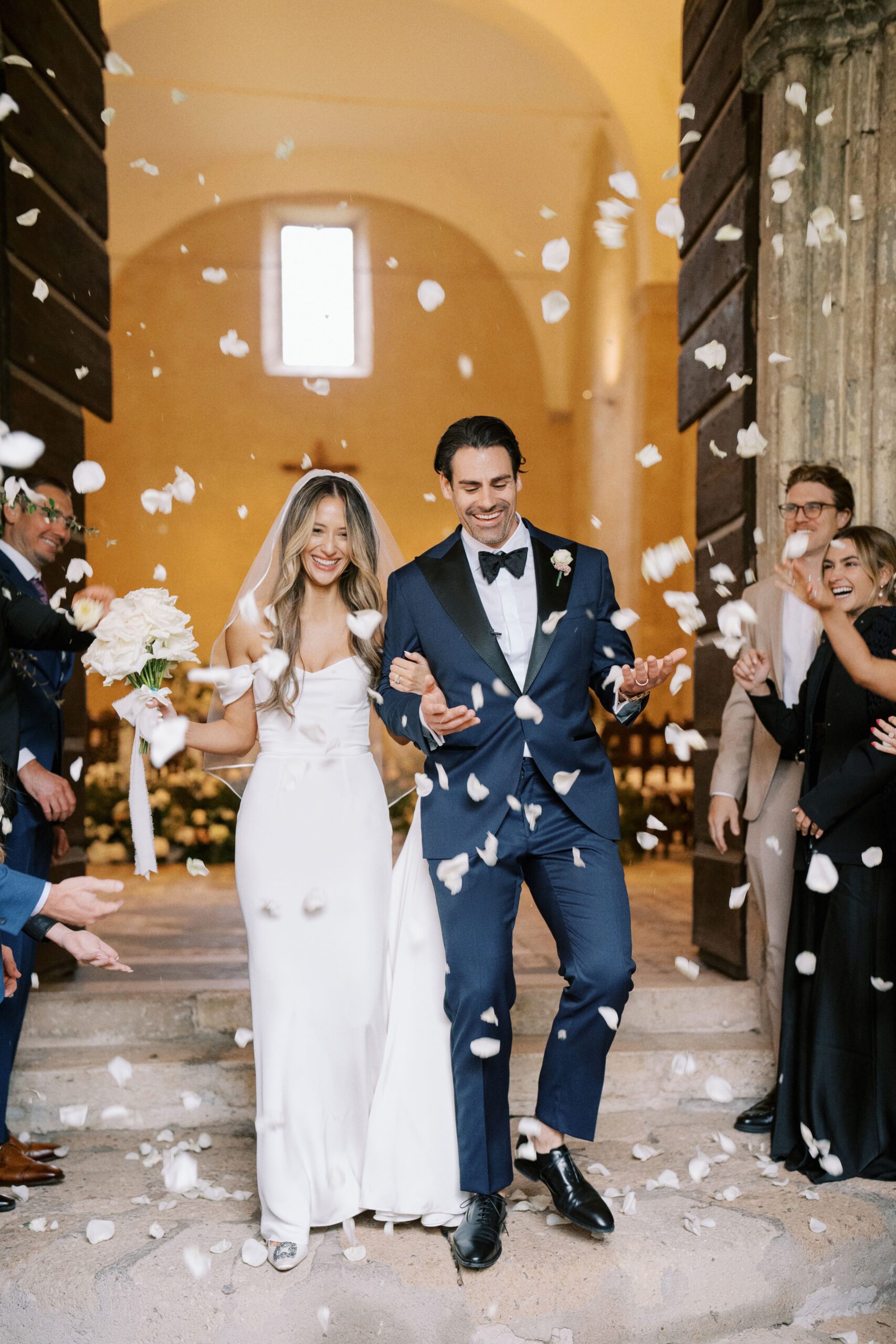 Tossing of rice and rose petals outside the church at La Badia di Orvieto, Umbria