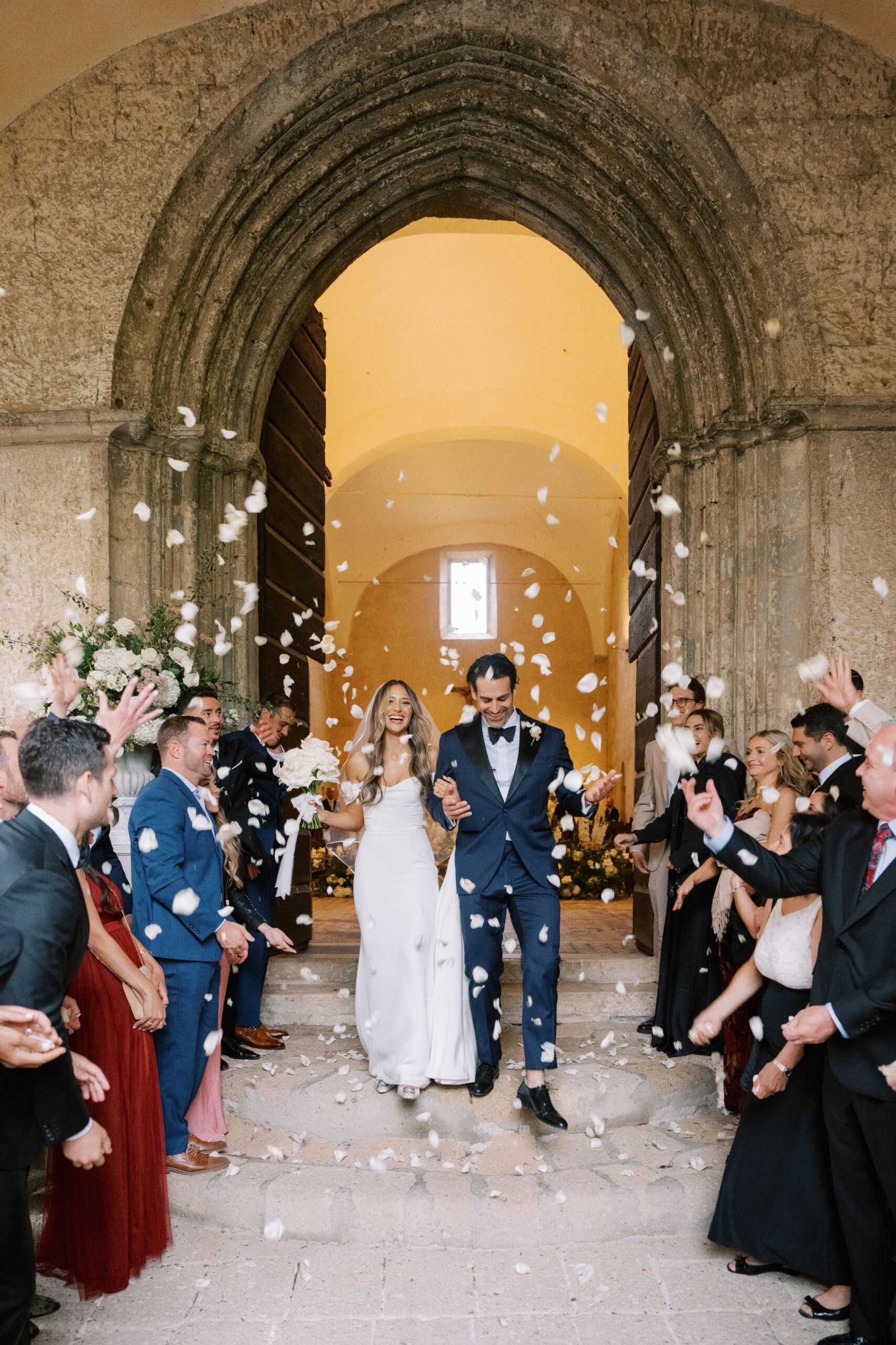 Tossing of rice and rose petals outside the church at La Badia di Orvieto, Umbria