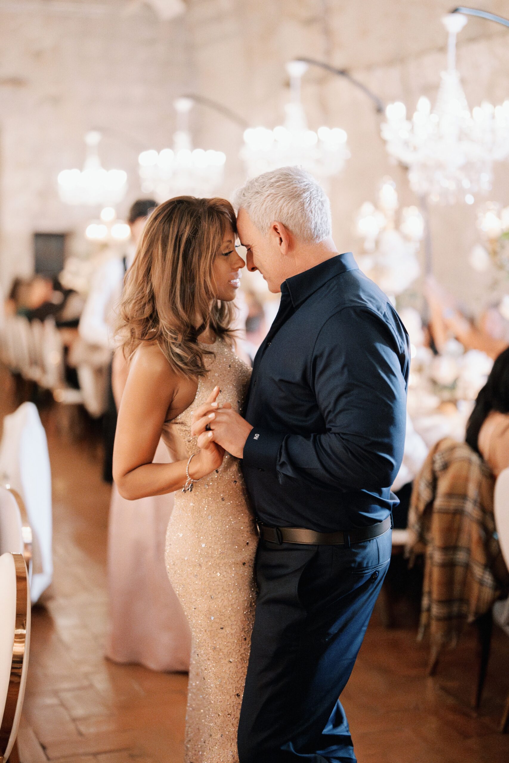 A dancing between two wedding guests