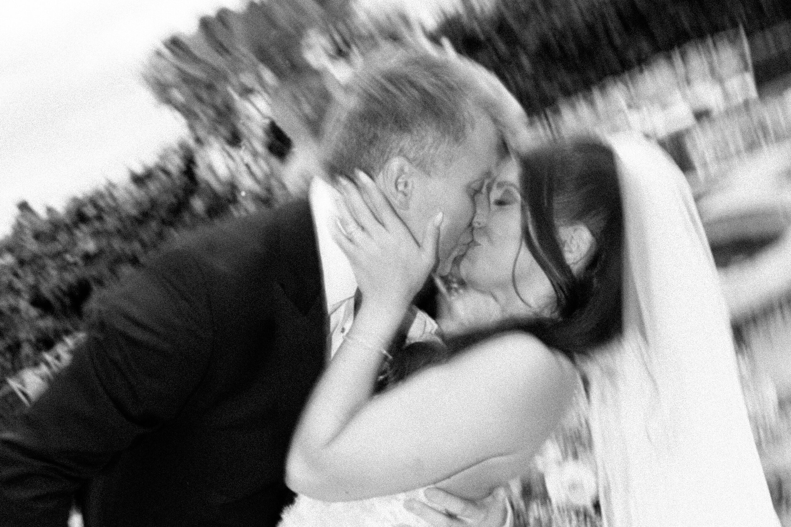 Bride and groom's romantic kiss